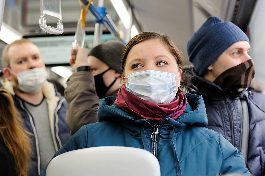 Moscow. Russia. March 26, 2021. Young Woman In A Surgical Protec