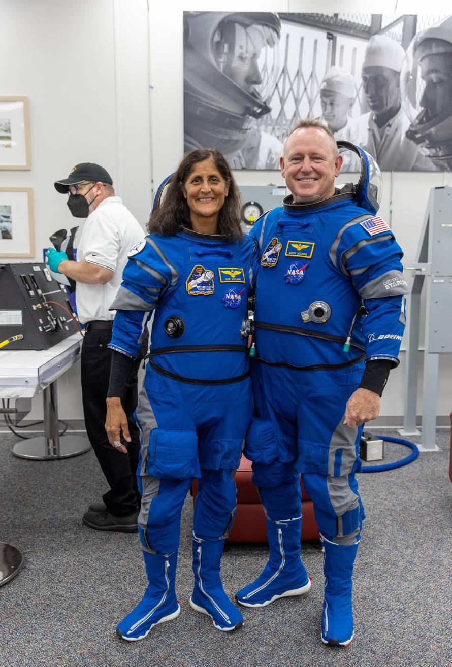Cape Canaveral, United States of America. 06 May, 2024. NASA astronaut Butch Wilmore, right, and fellow crewmate Suni Williams, left, pose together after pressure checks inside the Neil Armstrong Operations and Checkout building, before departing to Launc