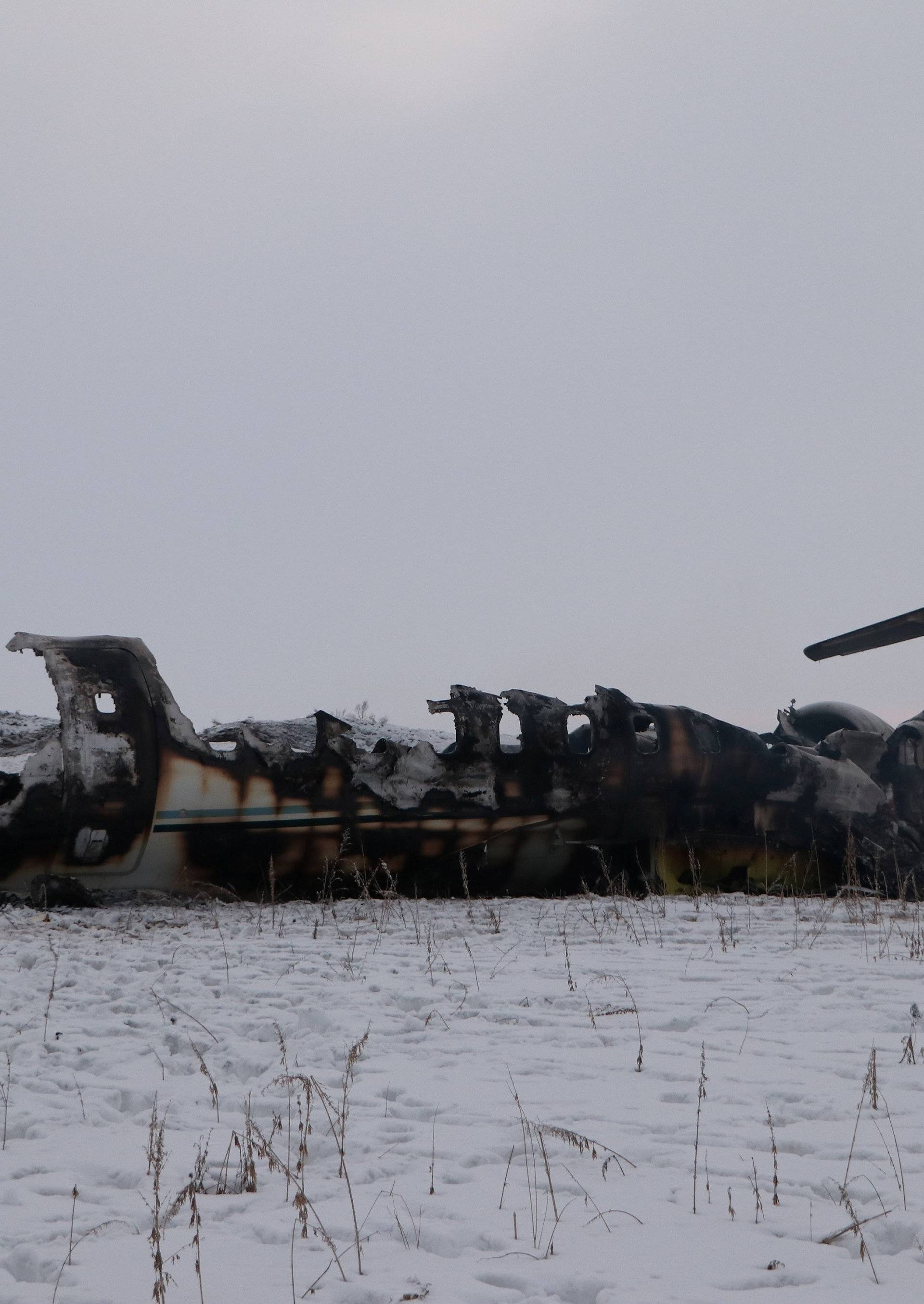 The wreckage of an airplane is seen after a crash in Deh Yak district of Ghazni province, Afghanistan