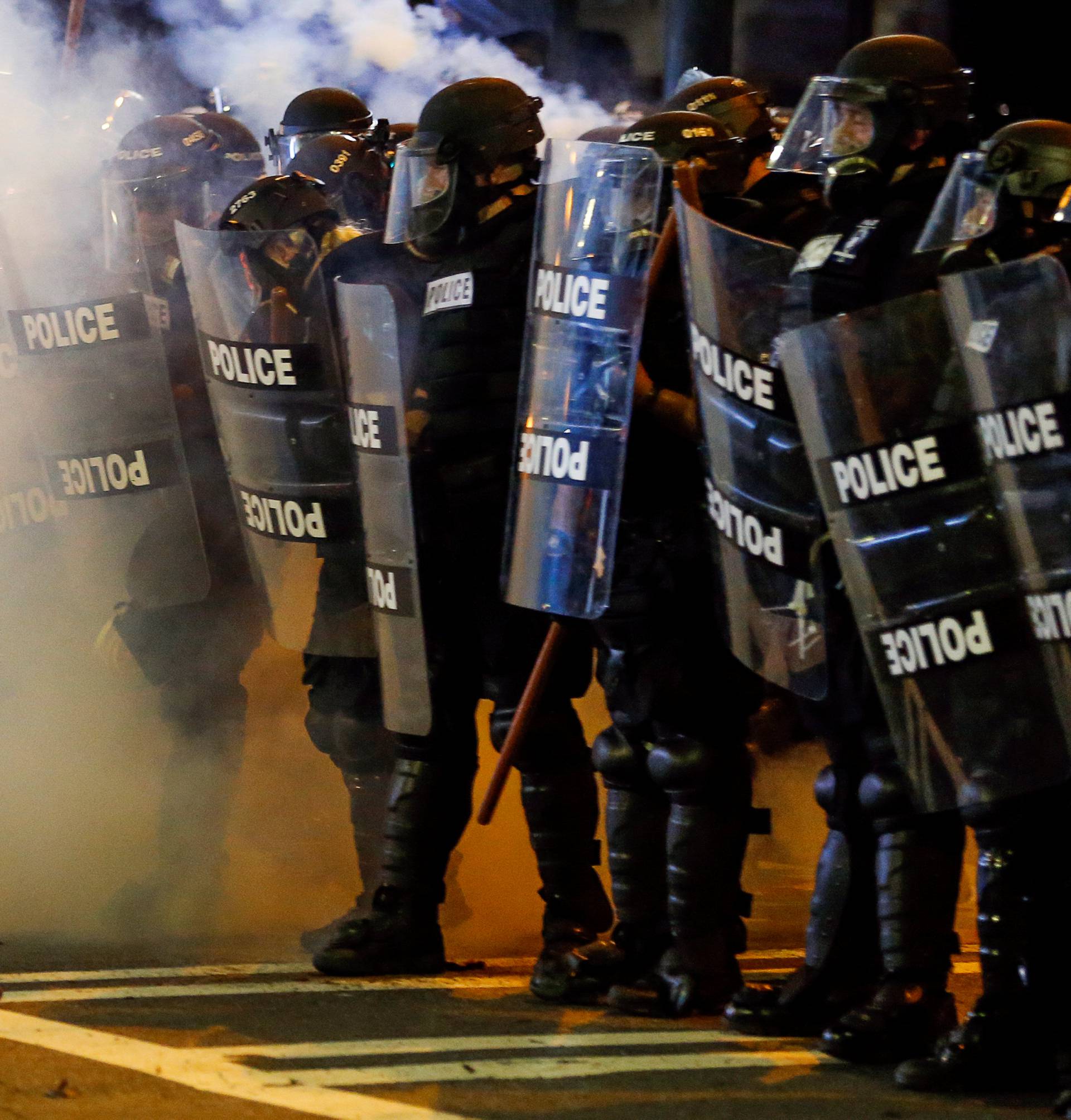 Police hold their lines in uptown Charlotte, NC during a protest of the police shooting of Keith Scott, in Charlotte