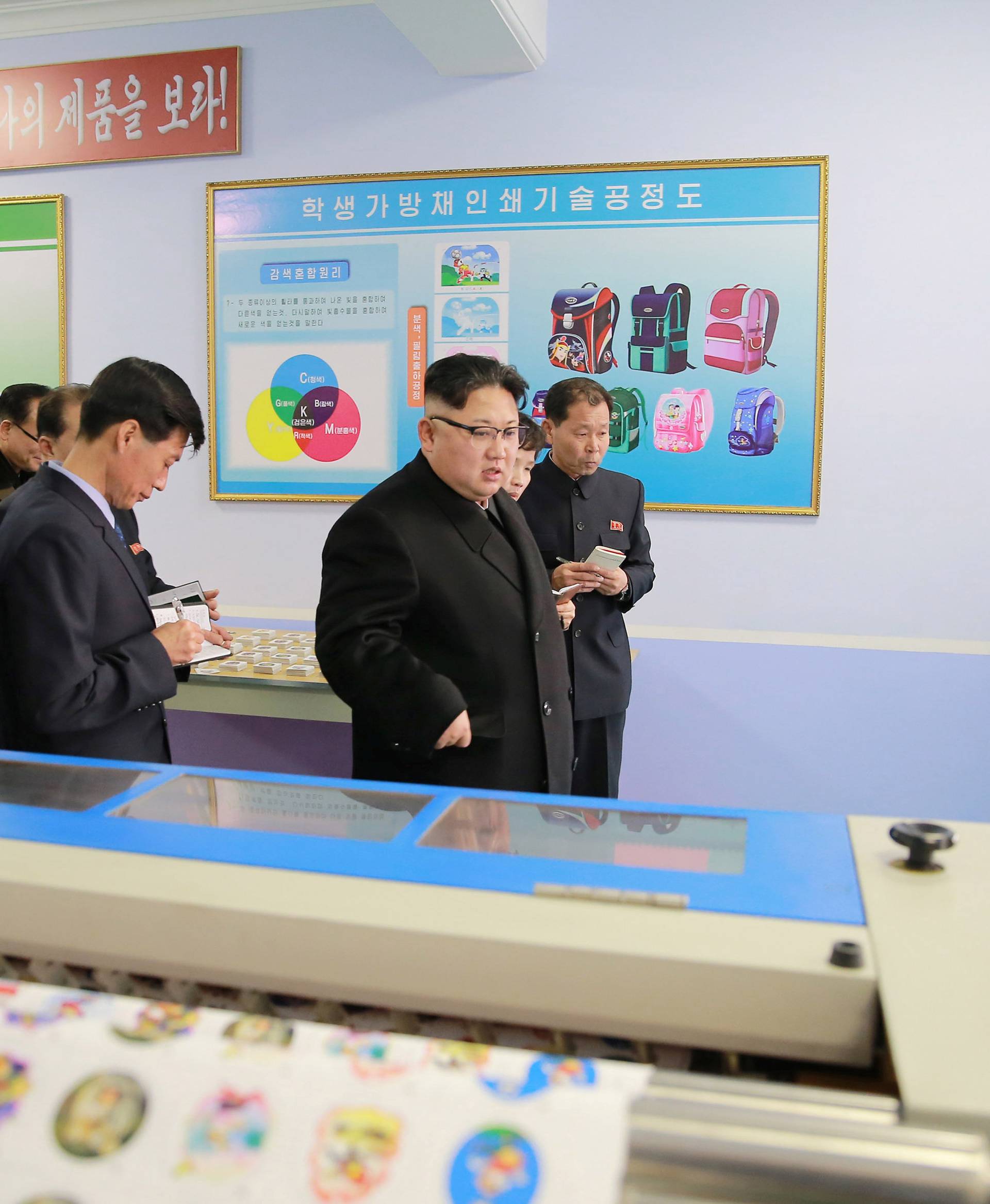 North Korean leader Kim Jong Un visits a newly built Pyongyang bag factory