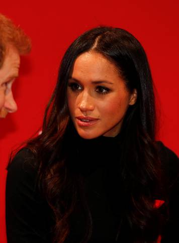 Britain's Prince Harry and his fiancee Meghan Markle visit the Terrence Higgins Trust World AIDS Day charity fair at Nottingham Contemporary in Nottingham