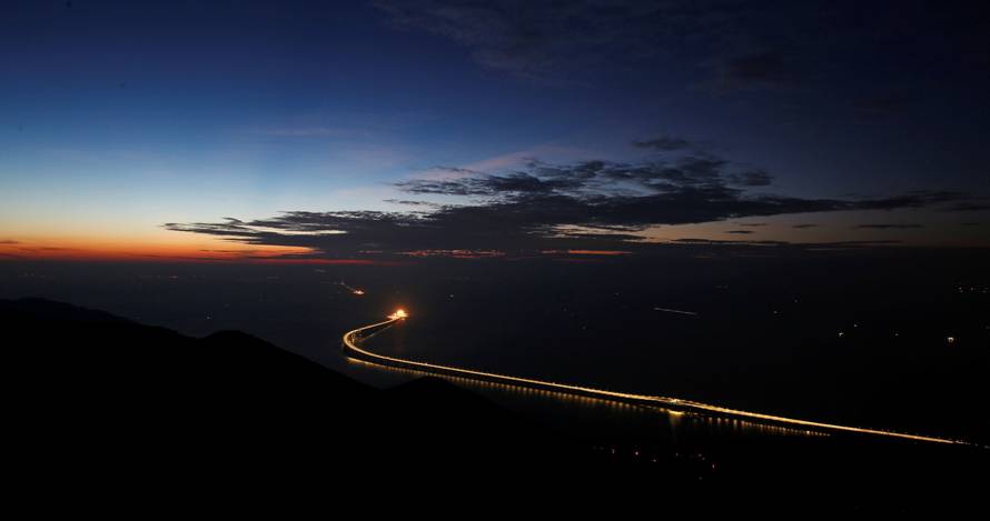 A sunset view of the Hong Kong-Zhuhai-Macau bridge off Lantau island in Hong Kong