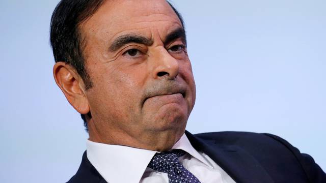 FILE PHOTO: Carlos Ghosn, chairman and CEO of the Renault-Nissan-Mitsubishi Alliance, attends the Tomorrow In Motion event on the eve of press day at the Paris Auto Show, in Paris