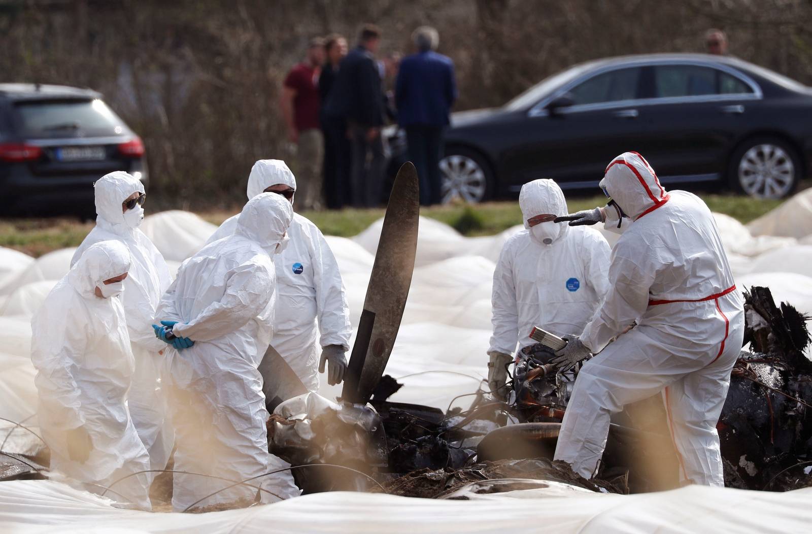 Experts from Germany and Russia inspect the wreckage of an Epic1000 plane in which Natalia Fileva, co-owner and chairwoman of Russia's second largest airline S7, was killed after the plane crashed in Erzhausen near Frankfurt