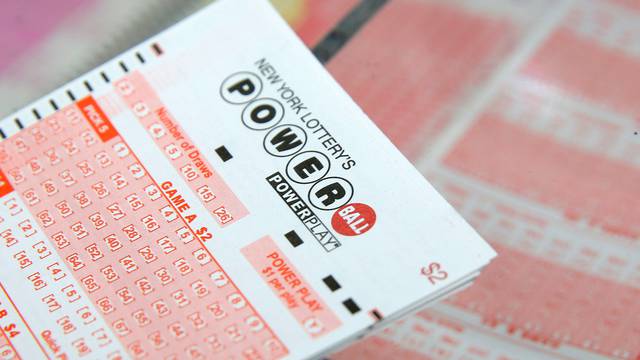 FILE PHOTO: A ticket for the U.S. lottery Powerball sits on a counter in a store on Kenmare Street in Manhattan, New York