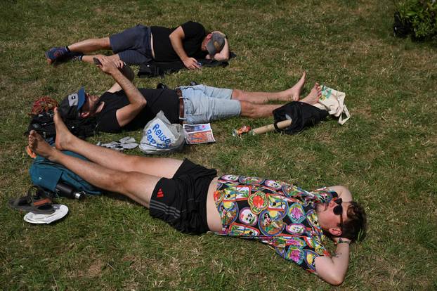Revellers attend Glastonbury Festival at Worthy Farm in Pilton, Somerset, Britain