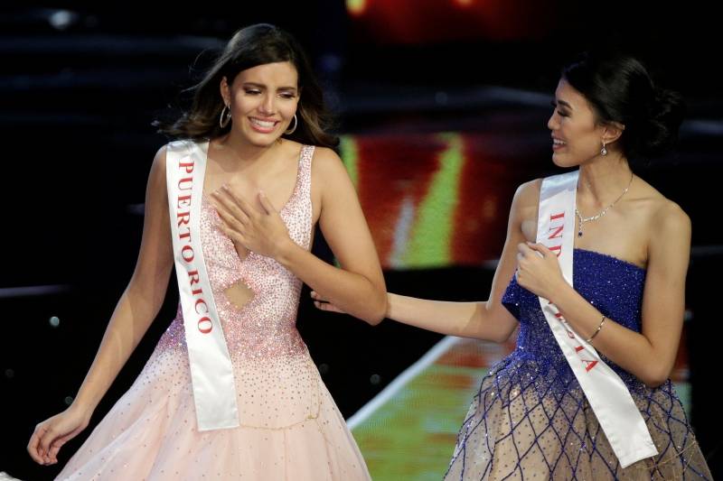 Miss Puerto Rico Stephanie Del Valle is greeted by second runner up Miss Indonesia Natasha Mannuela after winning the Miss World 2016 Competition in Oxen Hill, Maryland.