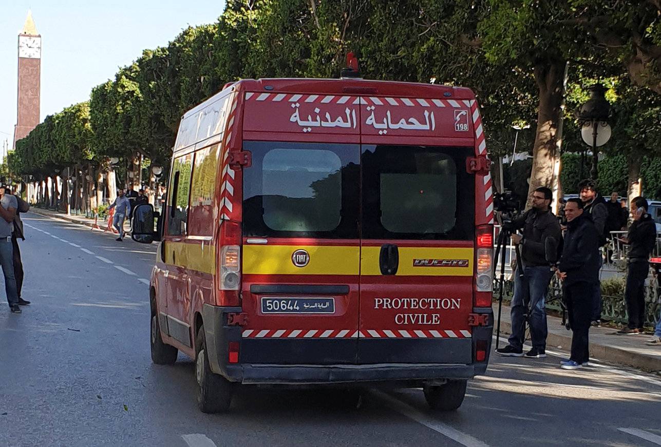 Civil protection vehicle drives near the site of an explosion in the center of the Tunisian capital Tunis
