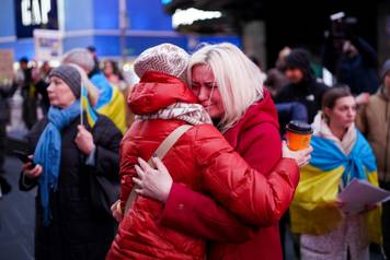 People rally in support of Ukraine to mark three years since Russian invasion of Ukraine