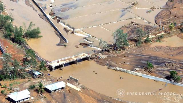 An aerial shot shows an impassable Caraycaray Bridge after it was destroyed when Typhoon Kai-tak, locally name Urduja, ravaged Biliran Province