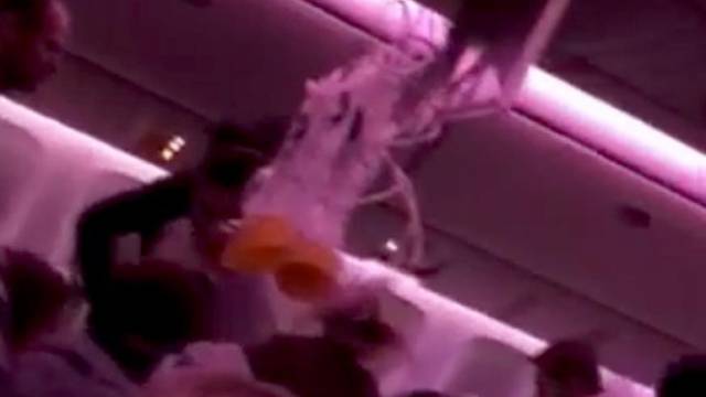 Oxygen masks fall during turbulence in the Air Canada AC 33 flight