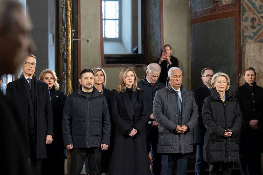 Prayer for peace inside the St. Sophia's Cathedral on the fourth anniversary of Russia's full-scale invasion, in Kyiv