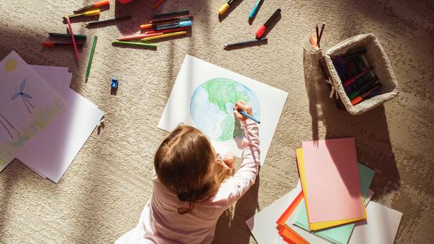 Top,View:,Little,Girl,Drawing,Our,Beautiful,Green,Planet,Earth.