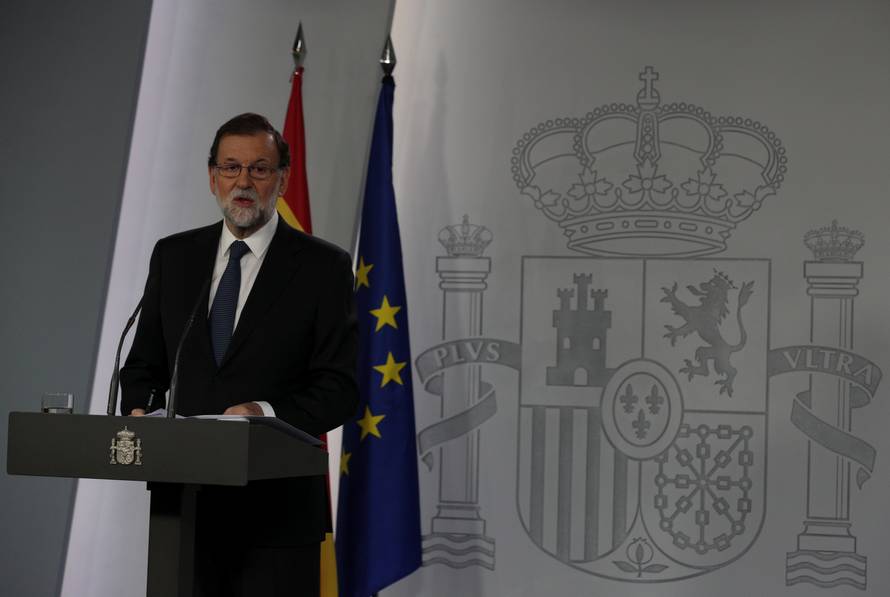 Spain's PM Rajoy delivers a statement at the Moncloa Palace in Madrid