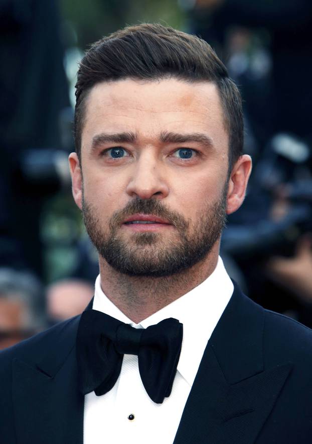 Actor Justin Timberlake poses on the red carpet as he arrives for the opening ceremony and the screening of the film "Cafe Society" out of competition during the 69th Cannes Film Festival in Cannes