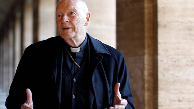 FILE PHOTO: Cardinal Theodore Edgar McCarrick smiles during an interview with Reuters at the North American College at the Vatican