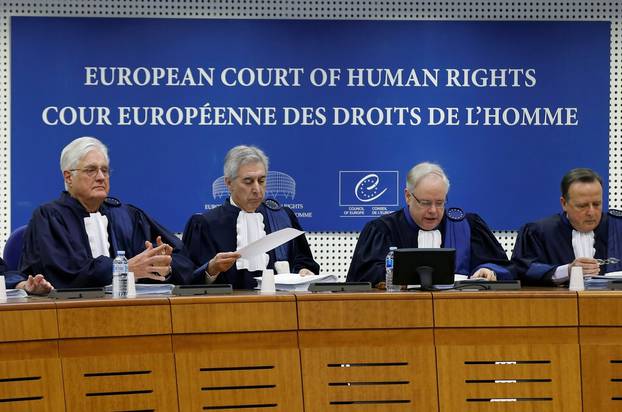 FILE PHOTO: Judges of the European Court of Human Rights sit in the courtroom at the start of an hearing concerning the case of Vincent Lambert in Strasbourg