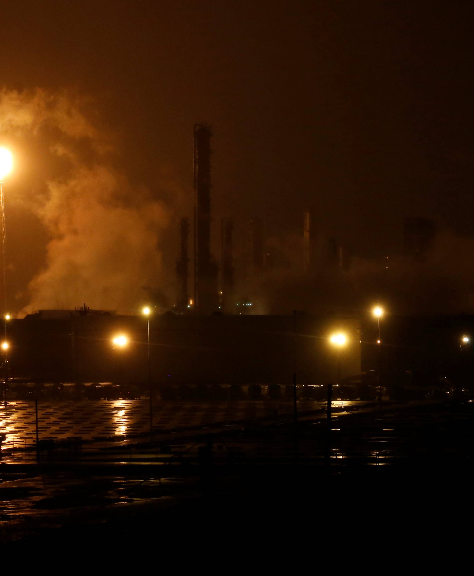 Shell Chemical LP plant is photographed from a nearby highway during Tropical Storm Harvey in Deer Park, Texas