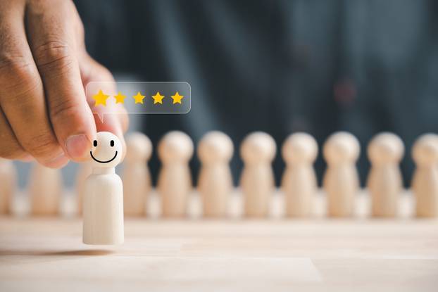 Business,Hiring,And,Recruitment,Selection.,Hand,Choosing,A,Wooden,Figure