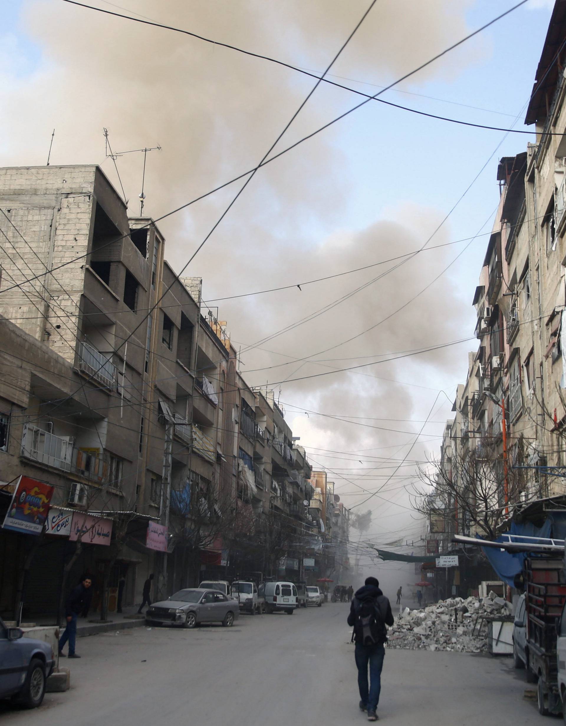 Smoke from air raid rises in the besieged town of Douma, Eastern Ghouta, Damascus