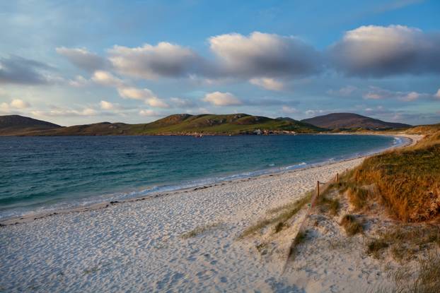 Morning light over a scottish sand dune backed beach