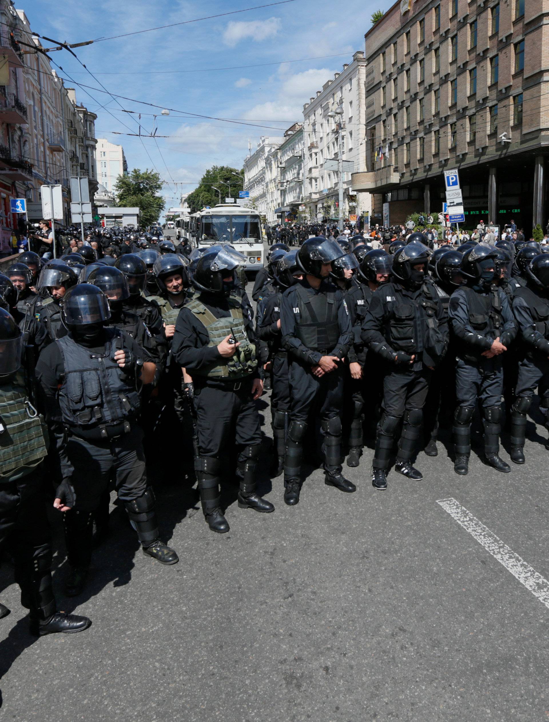 Policemen stand guard during Equality March in Kiev