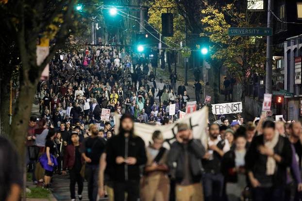 People march in protest to the election of Republican Donald Trump as the president of the United States in Seattle, Washington