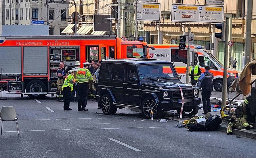 Car drives into group of people