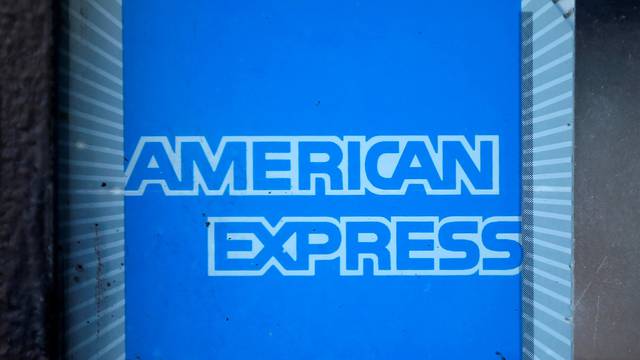 FILE PHOTO: The logo of Dow Jones Industrial Average stock market index listed company American Express (AXP) is seen in Los Angeles