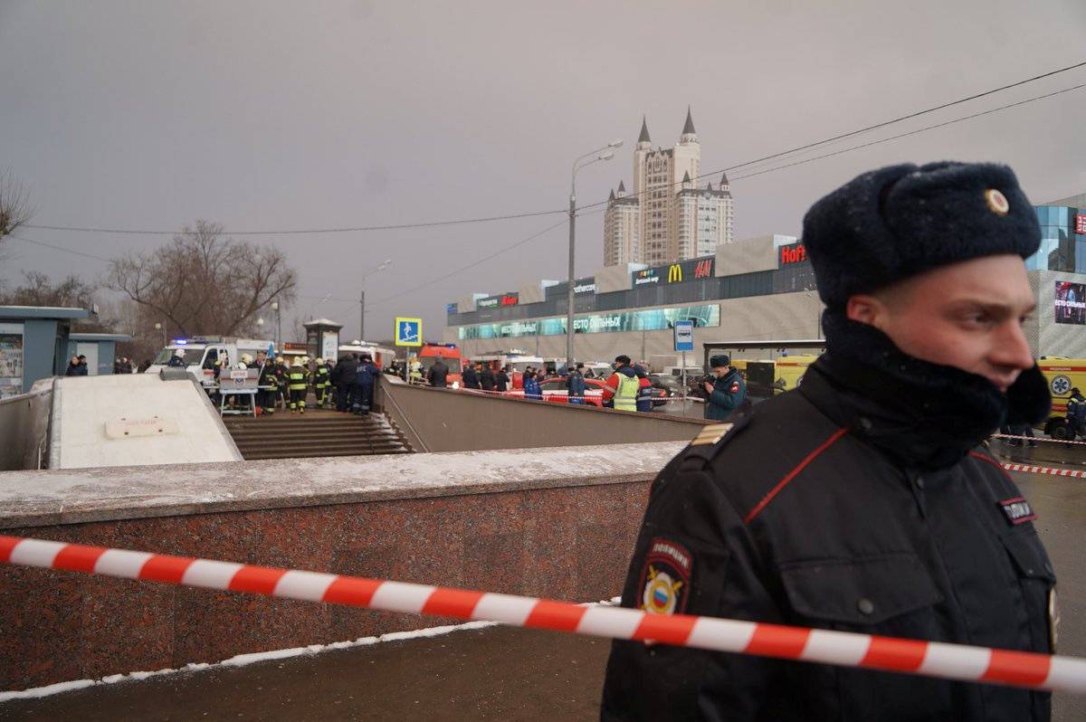 Rescue personnel gather at the scene of a crash at the scene of a crash involving a passenger bus in Moscow