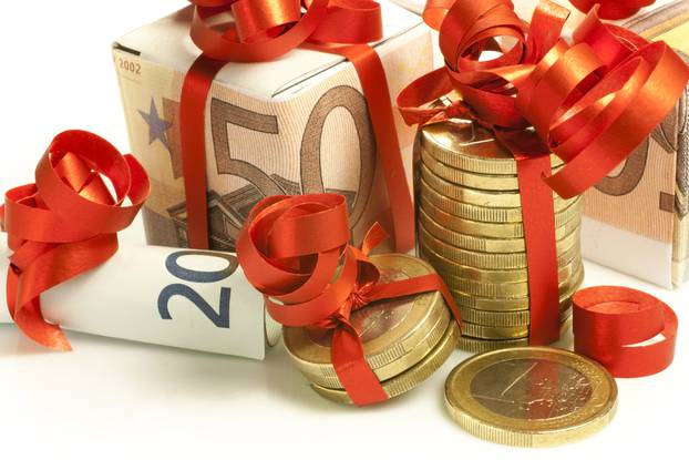 Euro,Banknotes,And,Coins,Wrapped,As,A,Gift