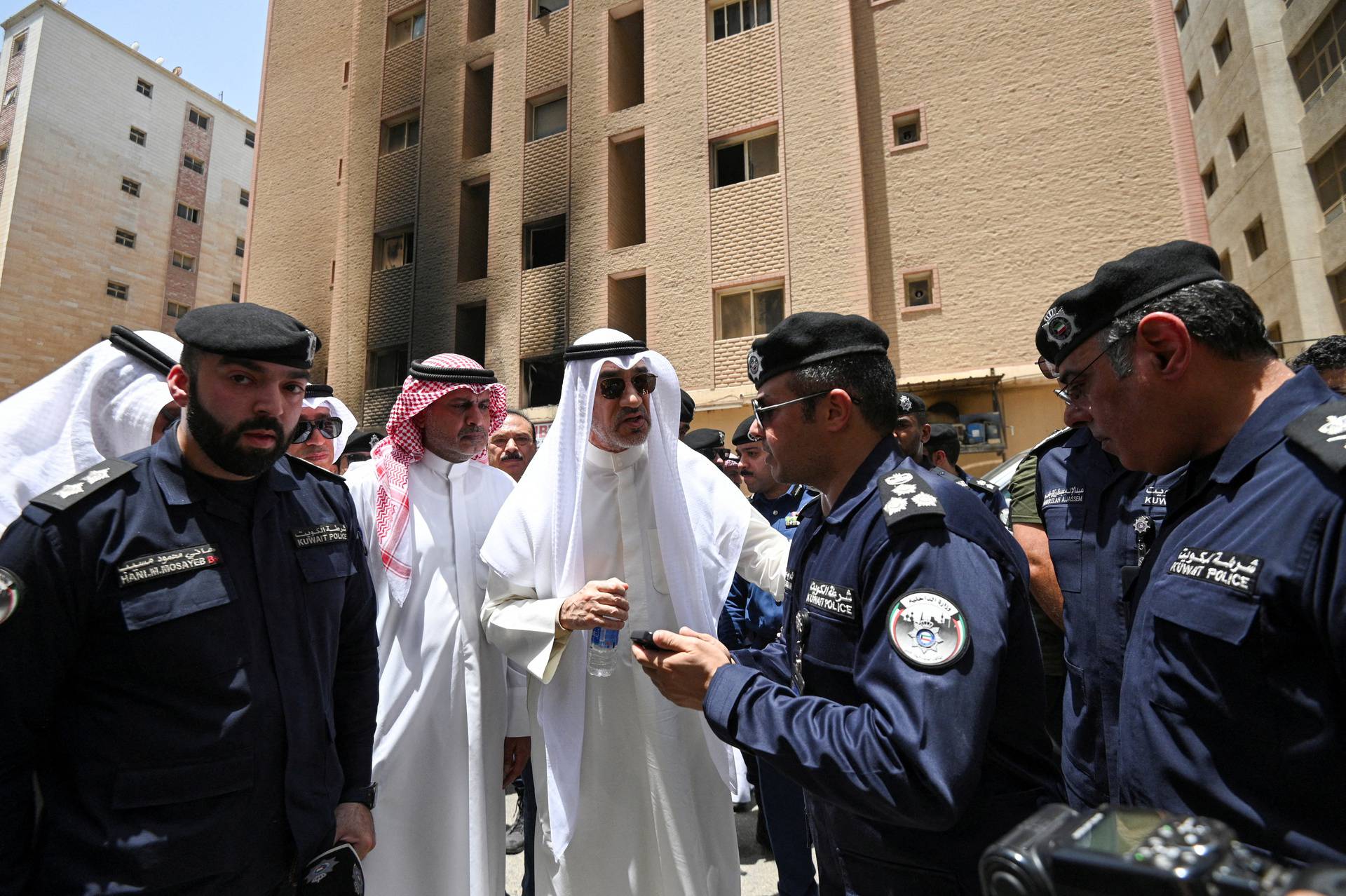 Aftermath of a deadly fire in a building, in Mangaf