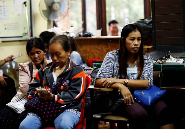 Family members wait near Tham Luang cave complex, as members of an under-16 soccer team and their coach have been found alive according to a local media report, in the northern province of Chiang Rai