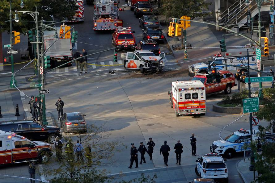 Emergency crews attend the scene of an alleged shooting incident on West Street in Manhattan, New York.