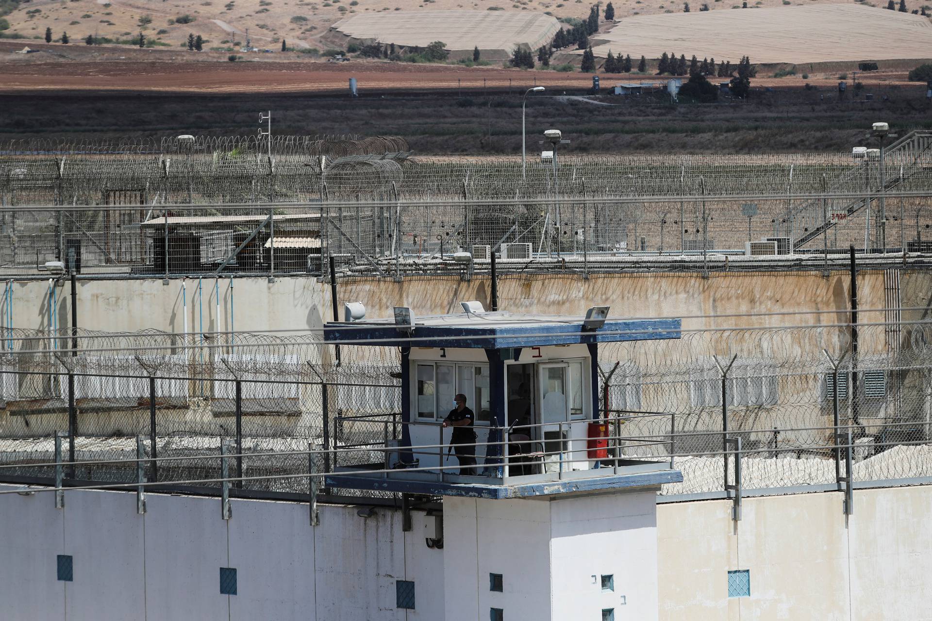A guard stands at a watch tower in Gilboa prison after six Palestinian militants broke out of it in north Israel