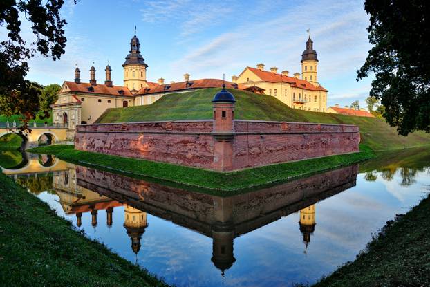 Nesvizh castle, reflected in the lake. Belarus, Europe