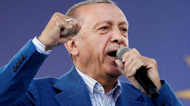 Supporters of Turkish President Tayyip Erdogan attend a rally in Istanbul