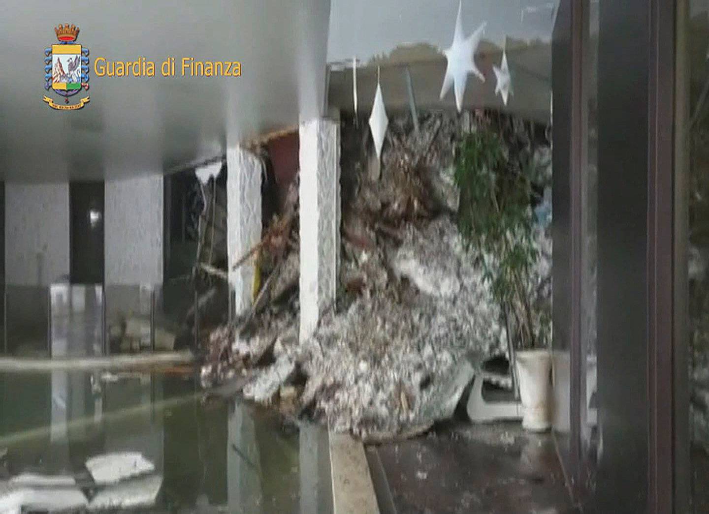 A photo taken from a video shows the snow inside the Hotel Rigopiano in Farindola, central Italy, hit by an avalanche