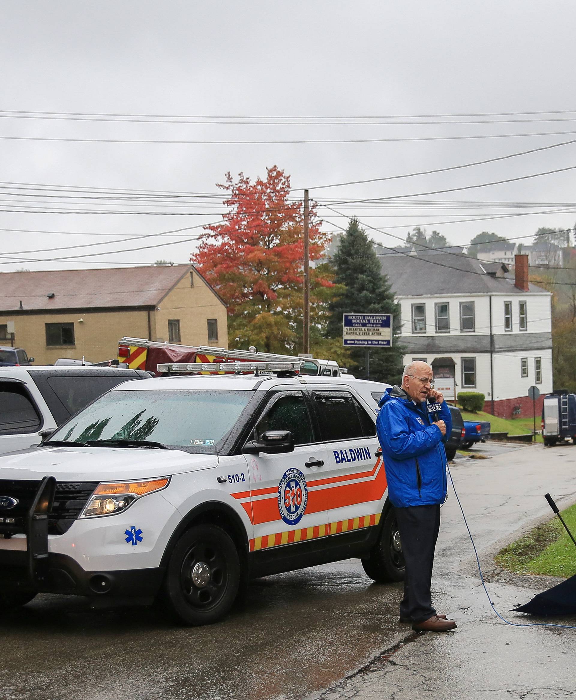 Police vehicles block off the road near the home of Pittsburgh synagogue shooting suspect Robert Bowers' home in Baldwin borough suburb of Pittsburgh