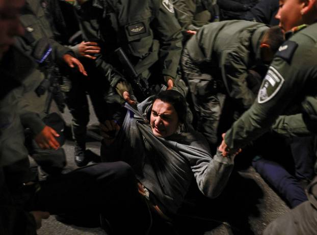 Israelis protest a ceasefire deal, in Jerusalem