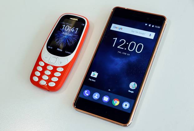 The Nokia 3310 and Nokia 6 are seen in an office in London