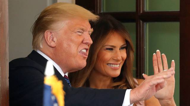 President Trump and Melania Trump bid farewell to Kenya President Kenyatta at the White House in Washington