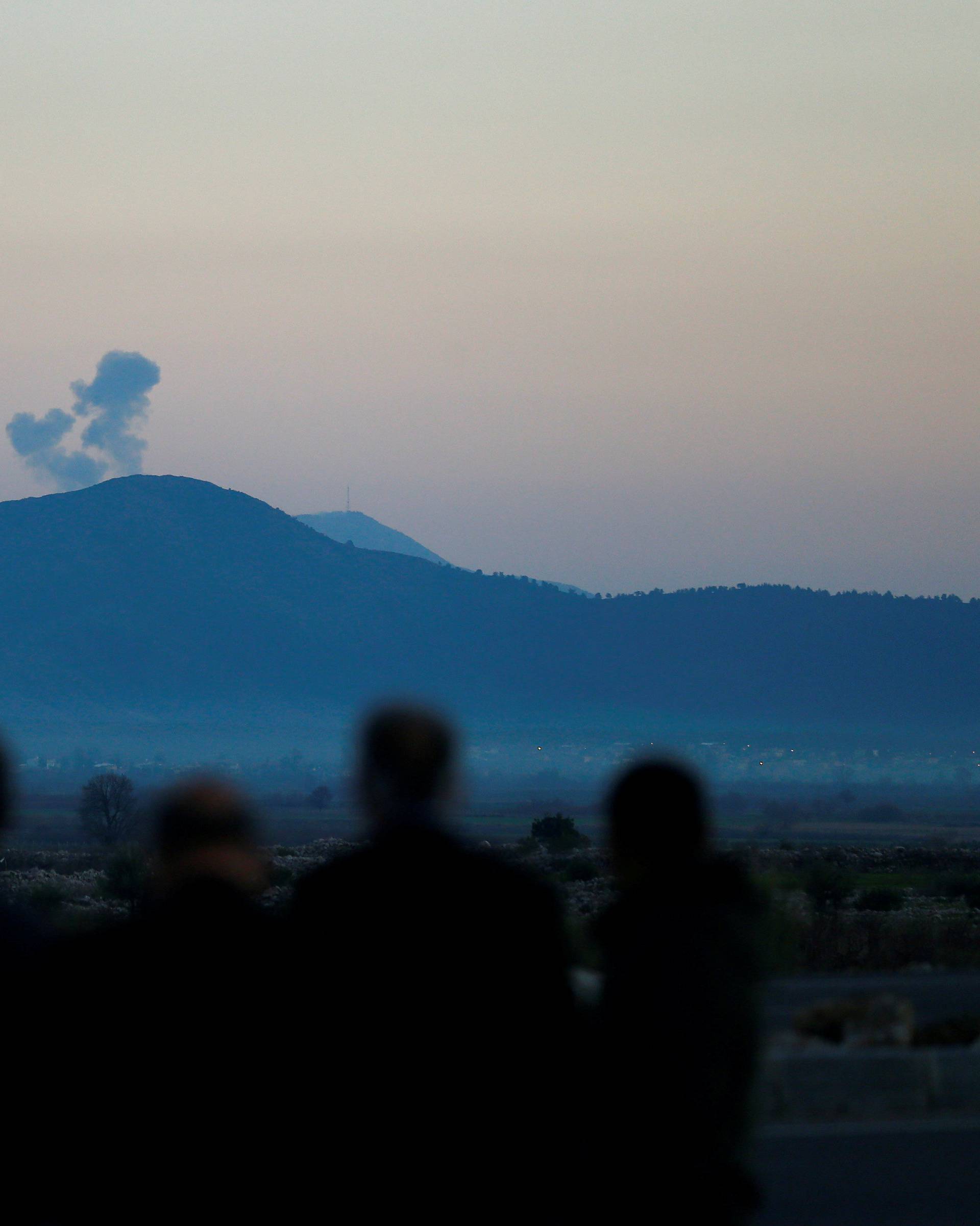 Smoke rises from the Syria's Afrin region, as it is pictured from near the Turkish town of Hassa, on the Turkish-Syrian border in Hatay province