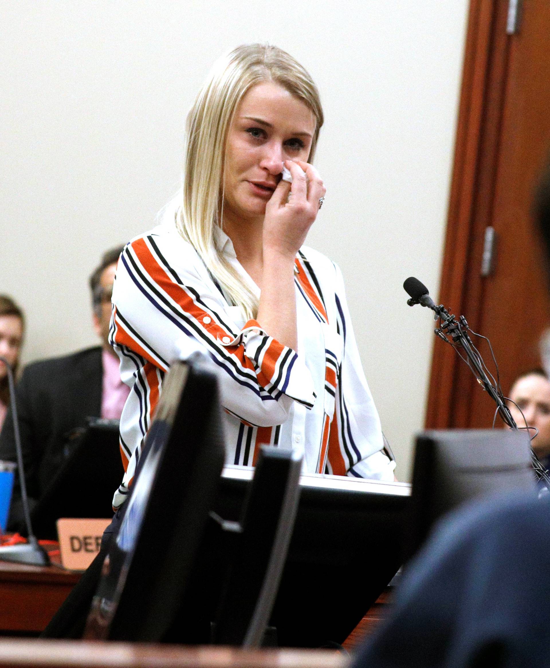 Victim Christine Harrison speaks at the sentencing hearing for Larry Nassar, a former team USA Gymnastics doctor who pleaded guilty in November 2017 to sexual assault charges, in Lansing