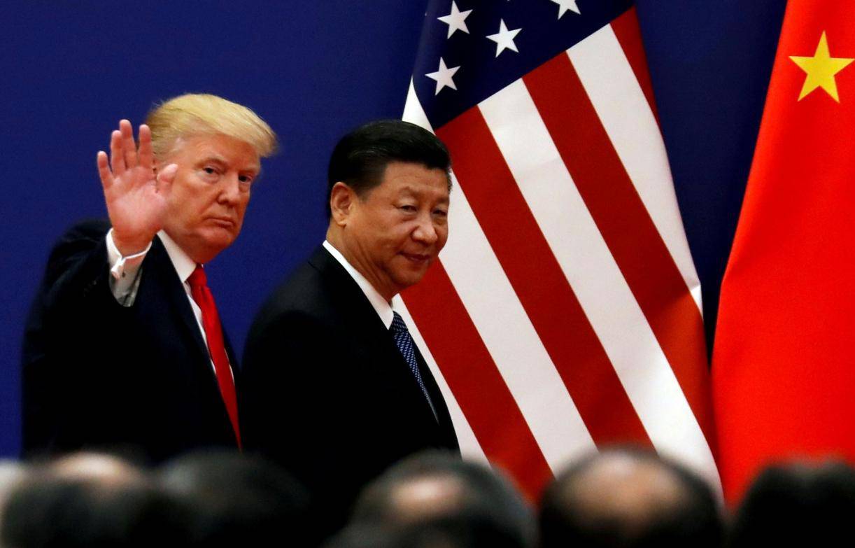 FILE PHOTO: FILE PHOTO: U.S. President Donald Trump and China's President Xi Jinping meet business leaders at the Great Hall of the People in Beijing