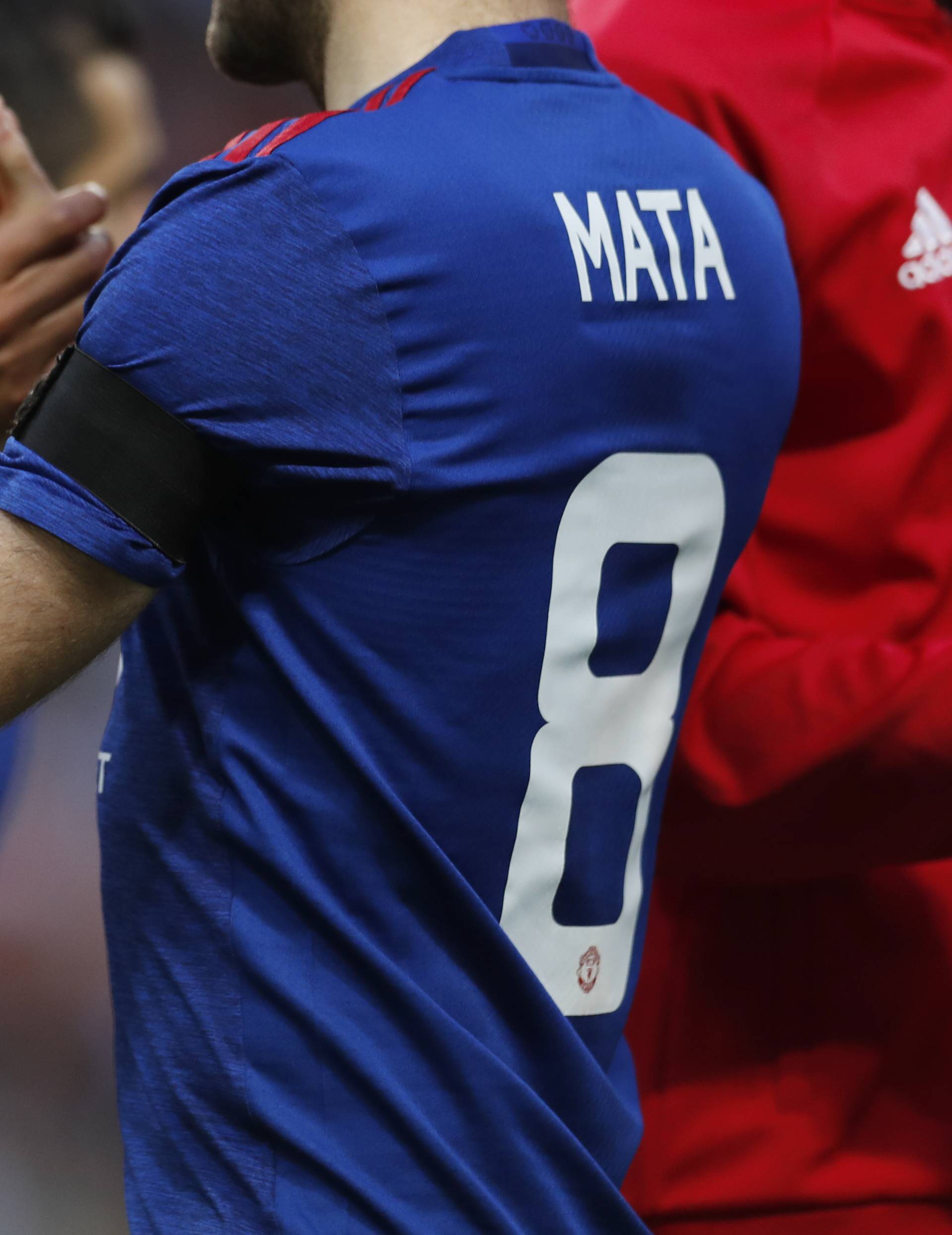 Manchester United's Juan Mata wearing a black armband in tribute to the victims of the Manchester attack