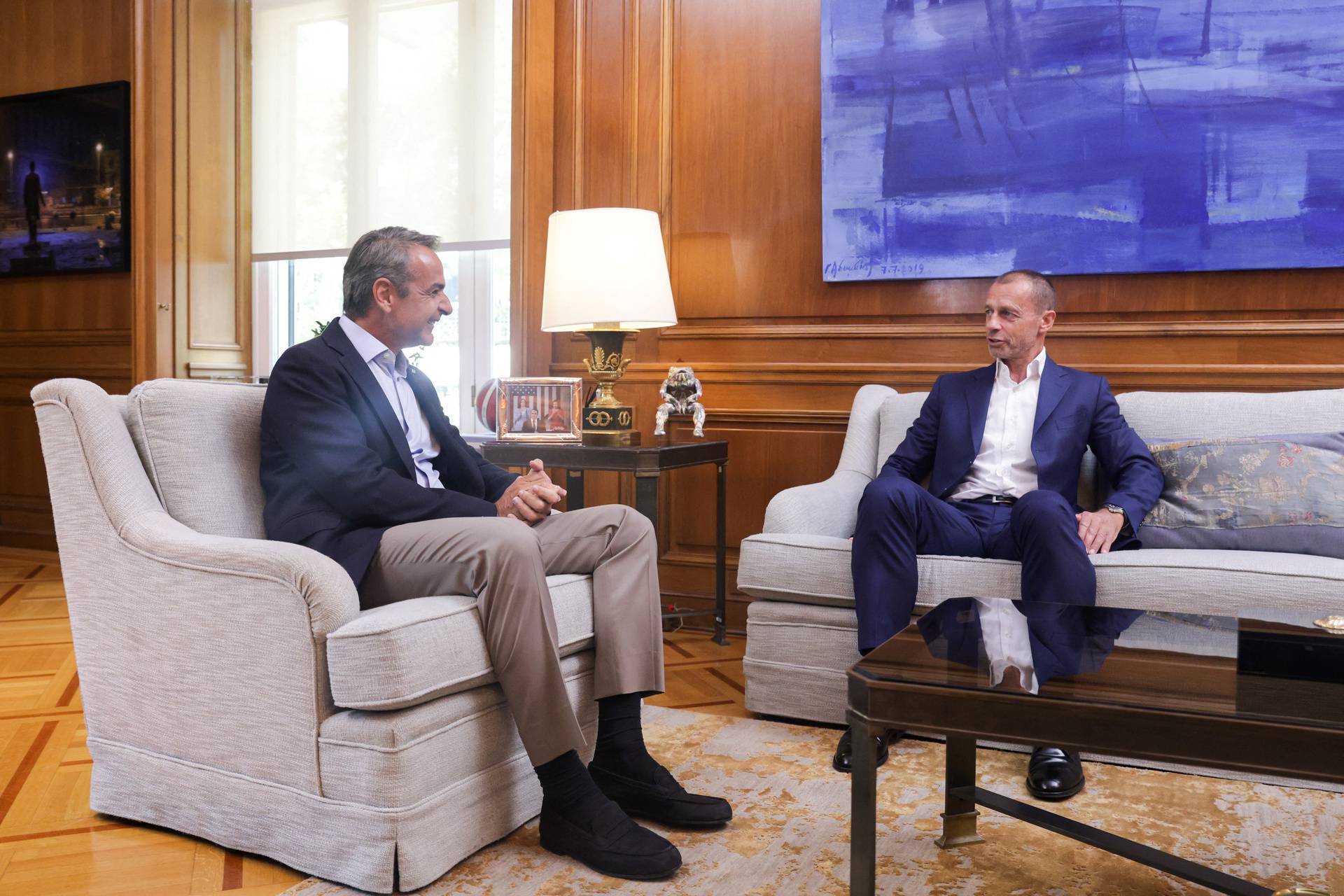 Greek PM Mitsotakis meets with UEFA President Ceferin at the Maximos Mansion, in Athens