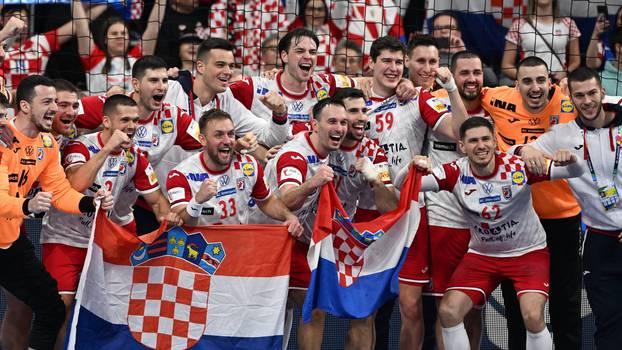 Mannheim, Germany, 120124. SAP Arena. EHF EURO 2024. Croatian players celebrate after winning the match agaiinst Spain,