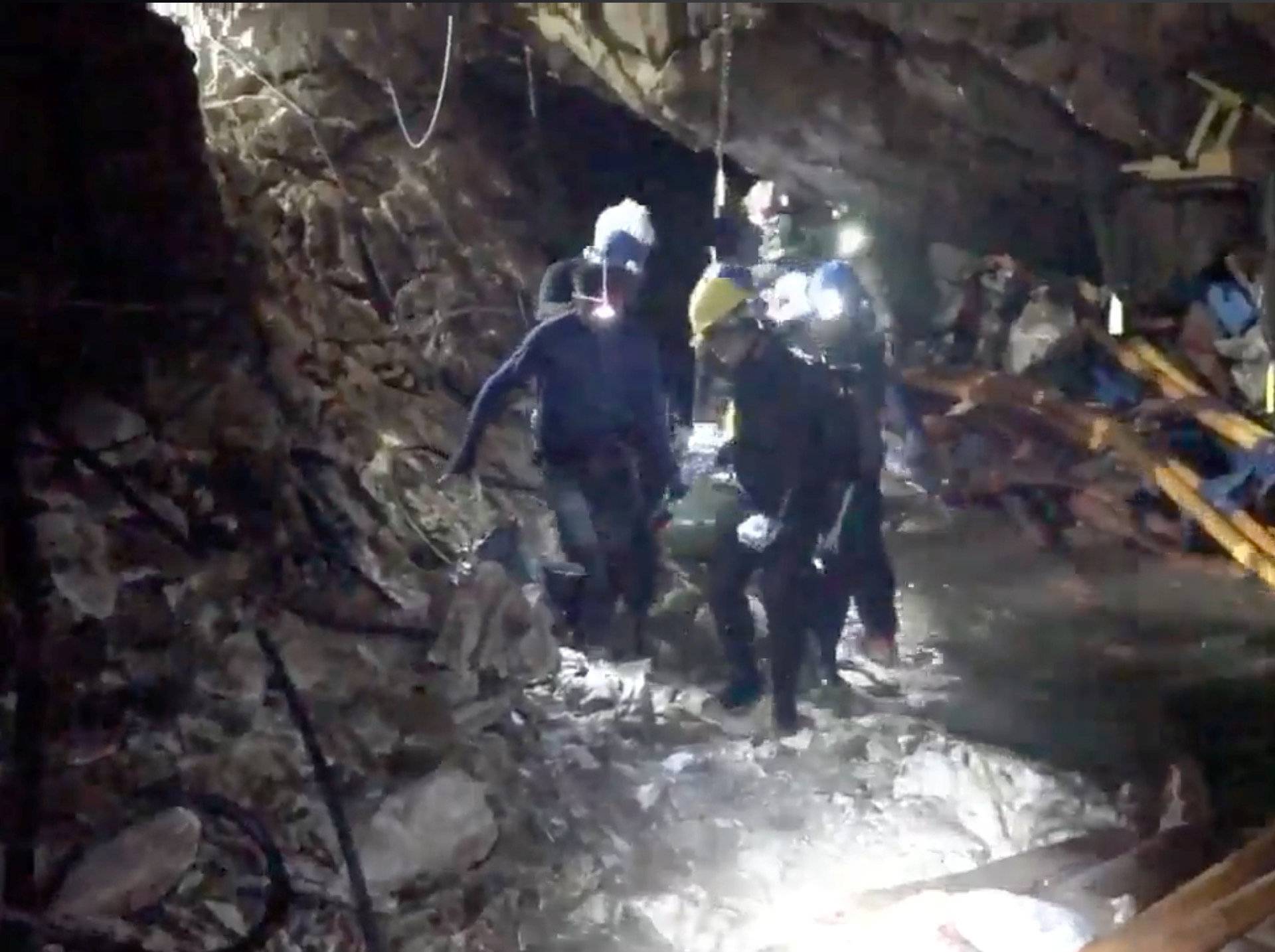 Rescue personnel work at the Tham Luang cave complex in the northern province of Chiang Rai